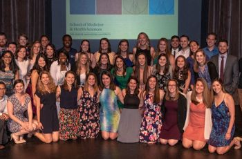 The Doctor of Physical Therapy class of 2019 standing together on a stage